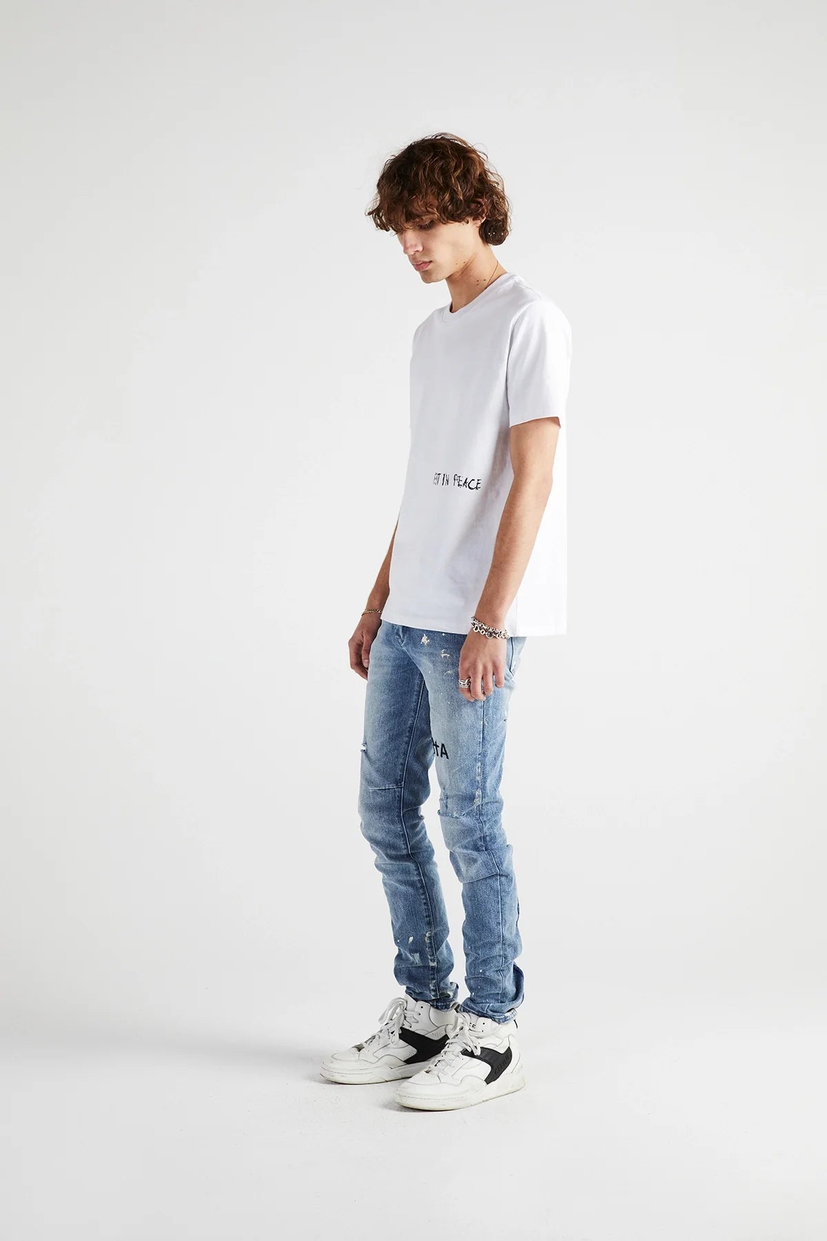 CLAYTON SKINNY JEAN | DISTRESSED WHITE PAINT SPLATTER