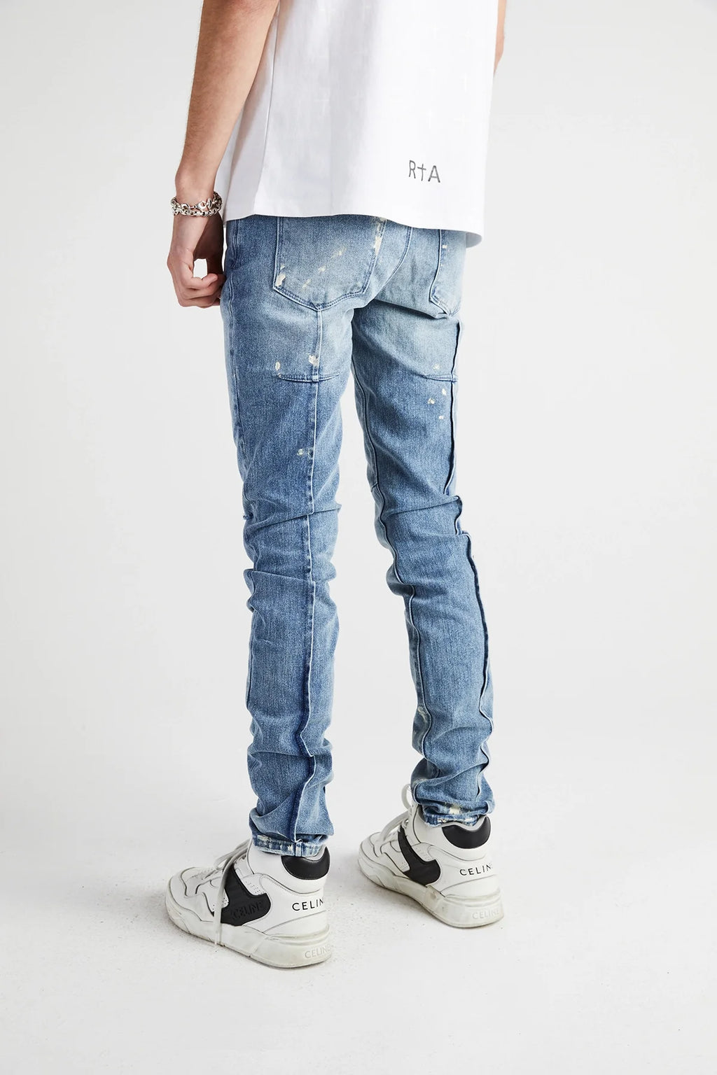 CLAYTON SKINNY JEAN | DISTRESSED WHITE PAINT SPLATTER