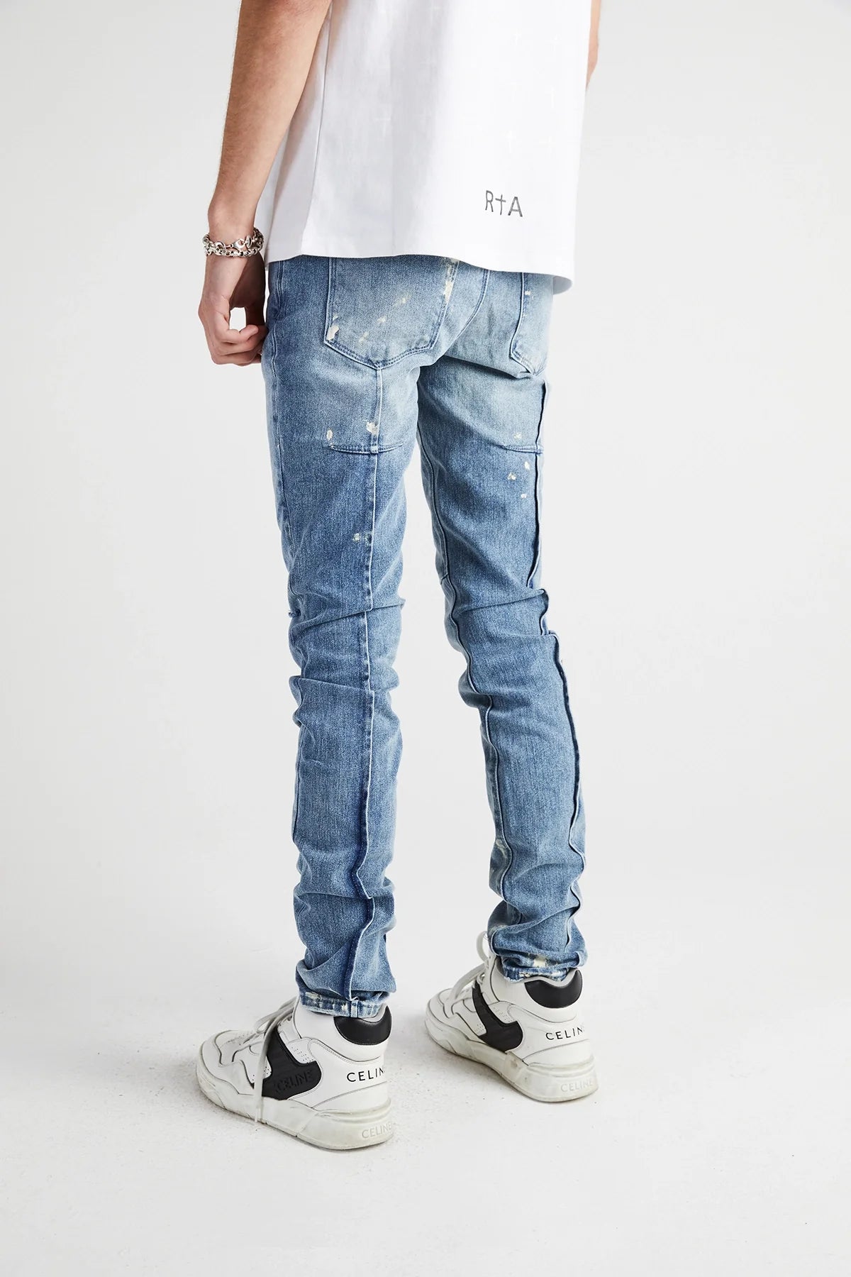 CLAYTON SKINNY JEAN | DISTRESSED WHITE PAINT SPLATTER