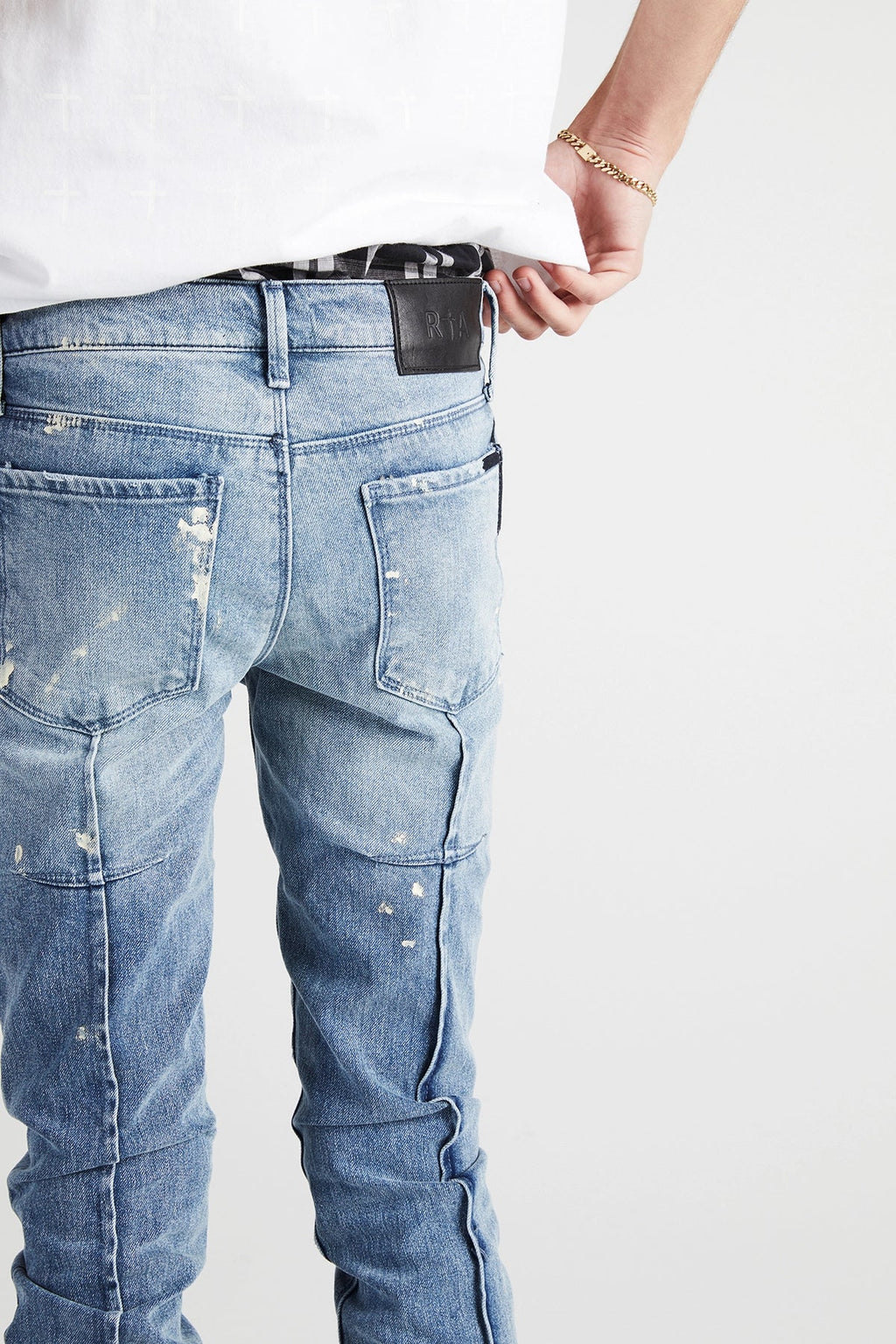 CLAYTON SKINNY JEAN | DISTRESSED WHITE PAINT SPLATTER