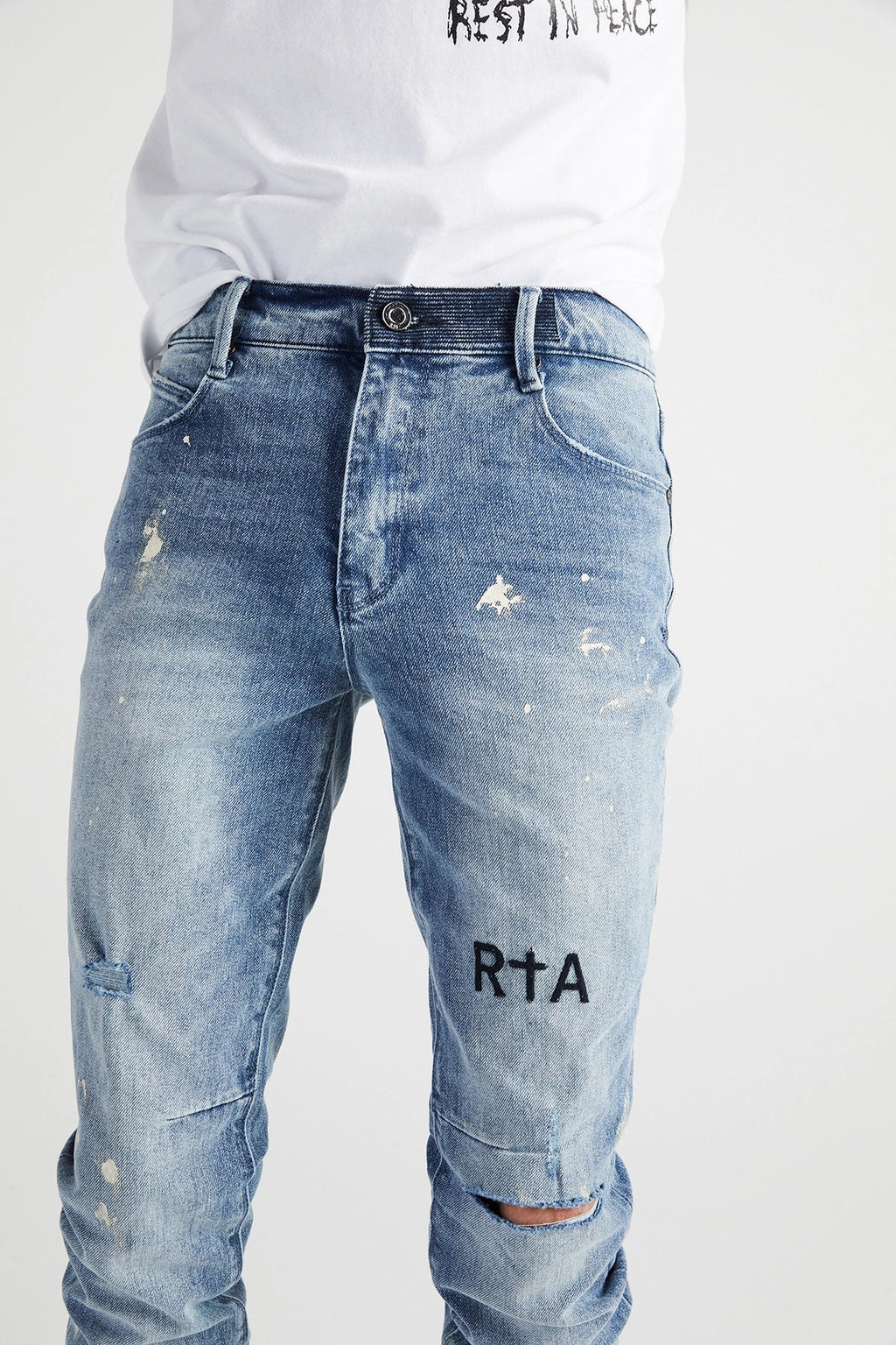 CLAYTON SKINNY JEAN | DISTRESSED WHITE PAINT SPLATTER